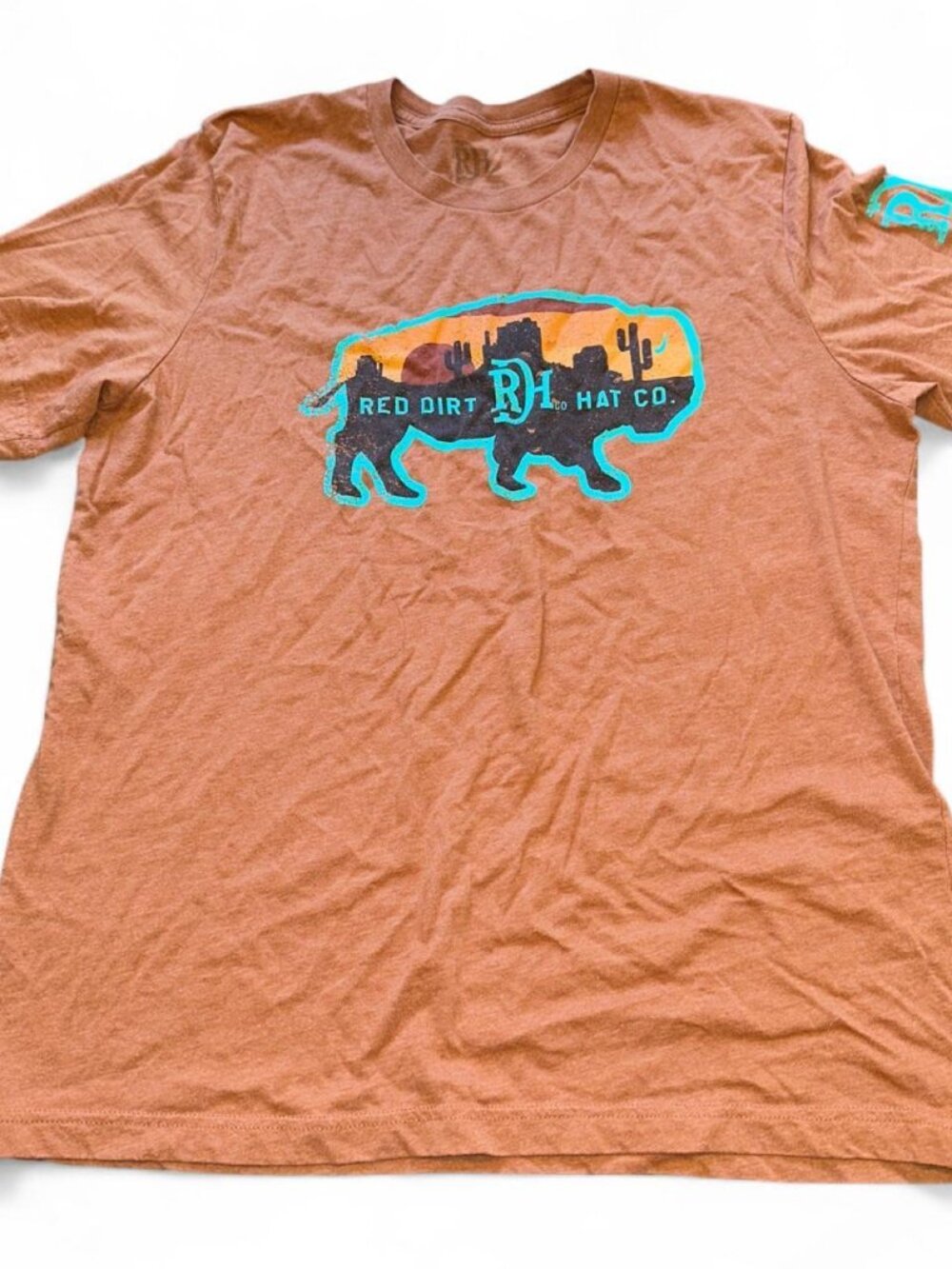 Red Dirt and Hat Co. orange t-shirt with buffalo graphic